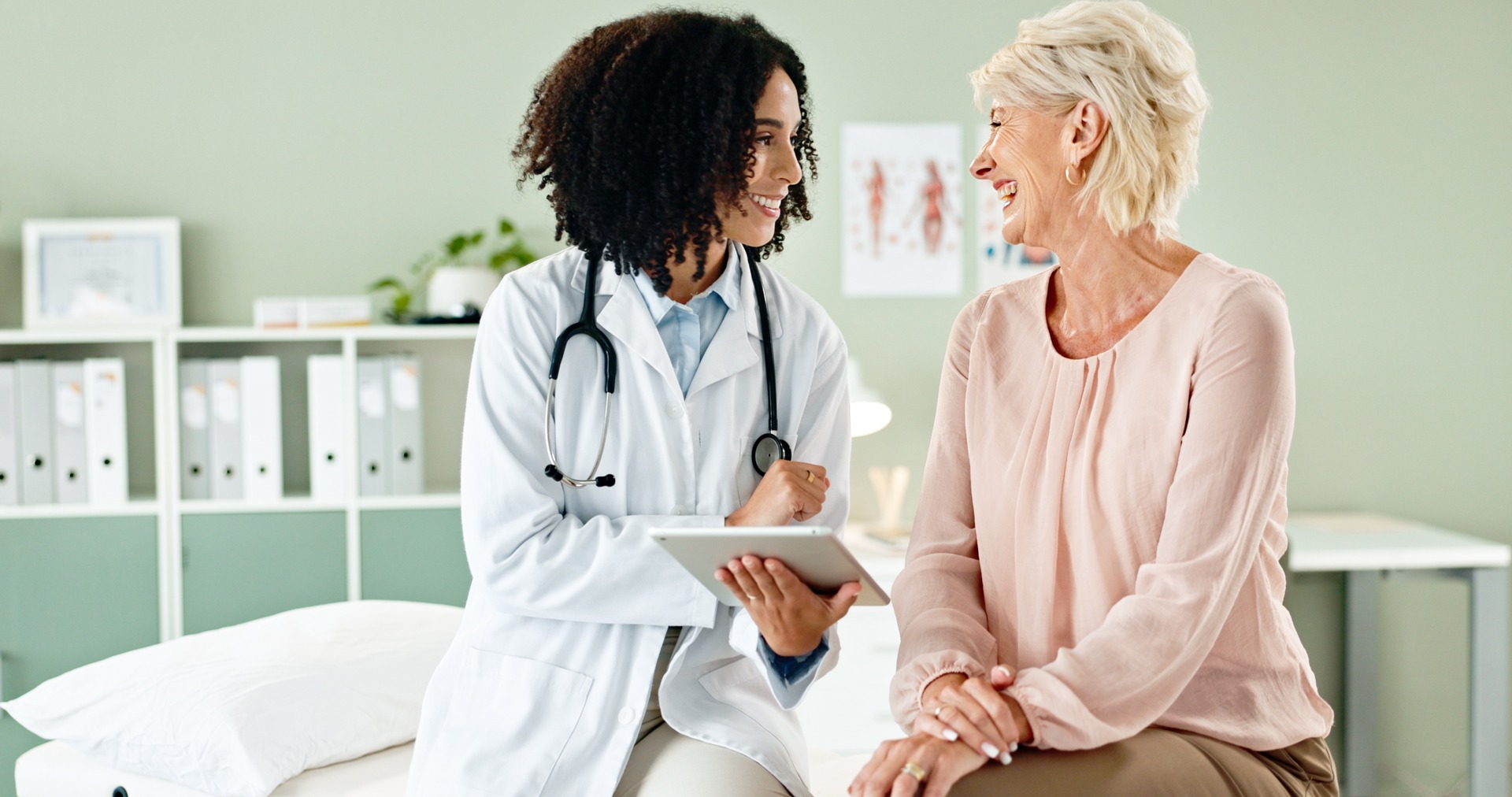 happy female doctor comforting a patient