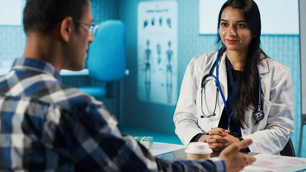 Doctor listening to a patient explain their condition